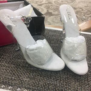 Ellie 5” clear heels size 8